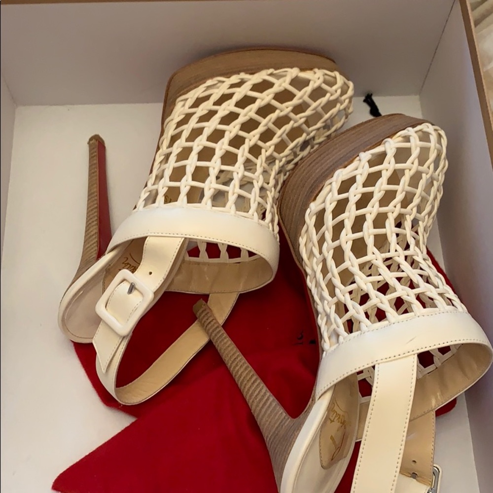 White Louboutin booties
